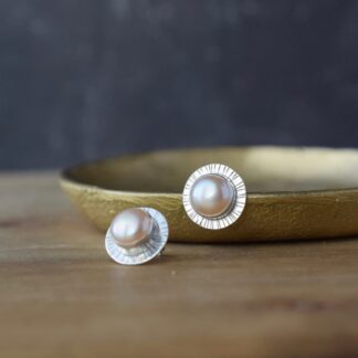 round silver stud earrings with peach pearls