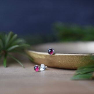tiny sterling silver studs hand set with rhodolite garnet semi precious stones