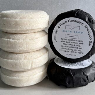 a solid shampoo bar wrapped in tissue paper. Scented with essential oils. without pls, silicone or parabens