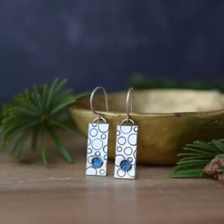 textured rectangular silver drop earrings with blue topaz stone