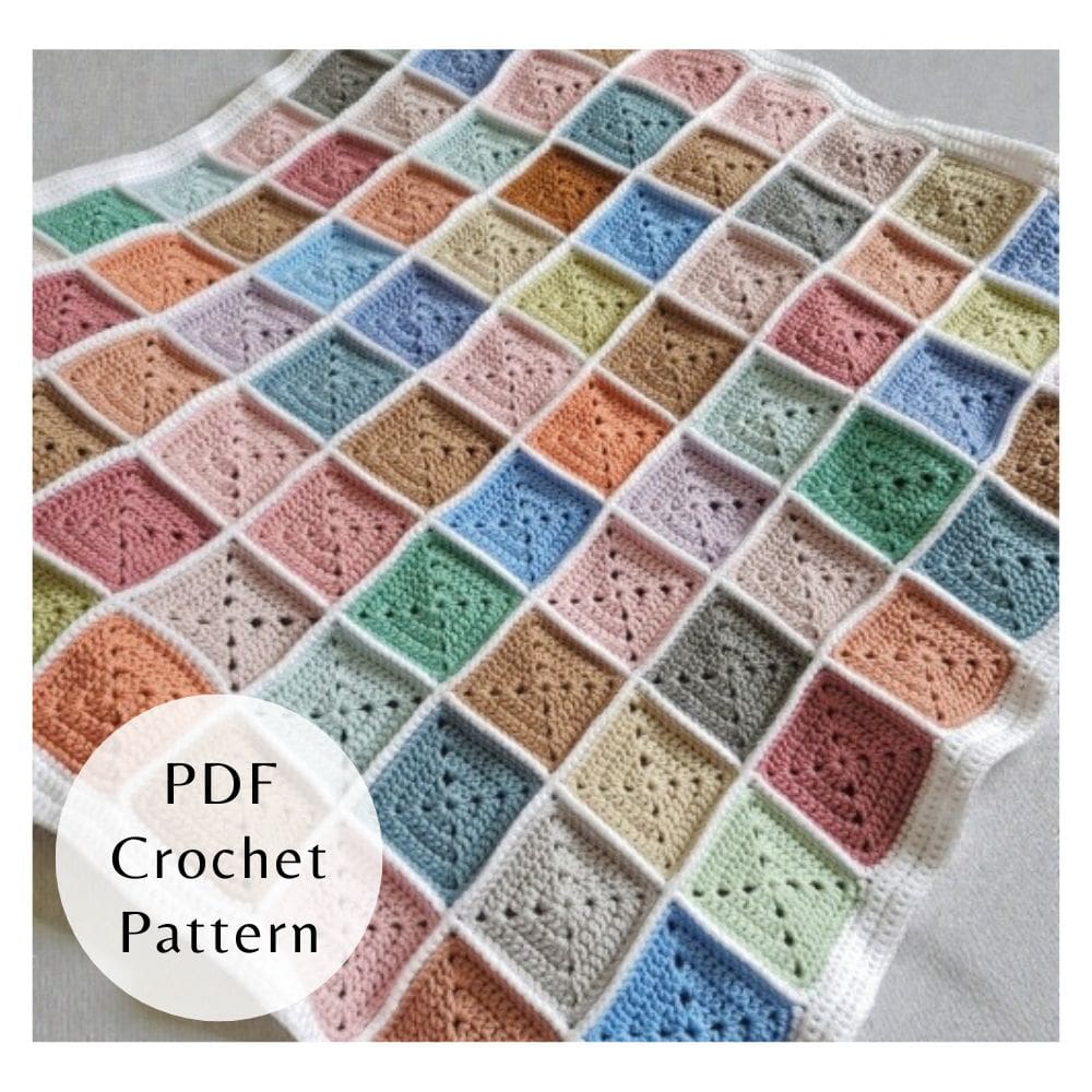 Digital PDF crochet pattern for a stash busting solid granny square baby blanket. Includes step-by-step photos and clear instructions for intermediate crocheters.