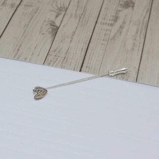 Sterling silver patterned heart on a sterling silver lapel pin with silver plated barrel protector