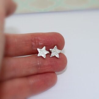 Textured silver star ear studs