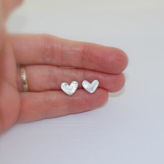 Silver textured heart stud earrings