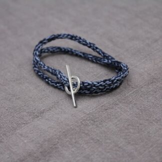 crochet bracelet in montana and navy with sterling silver findings