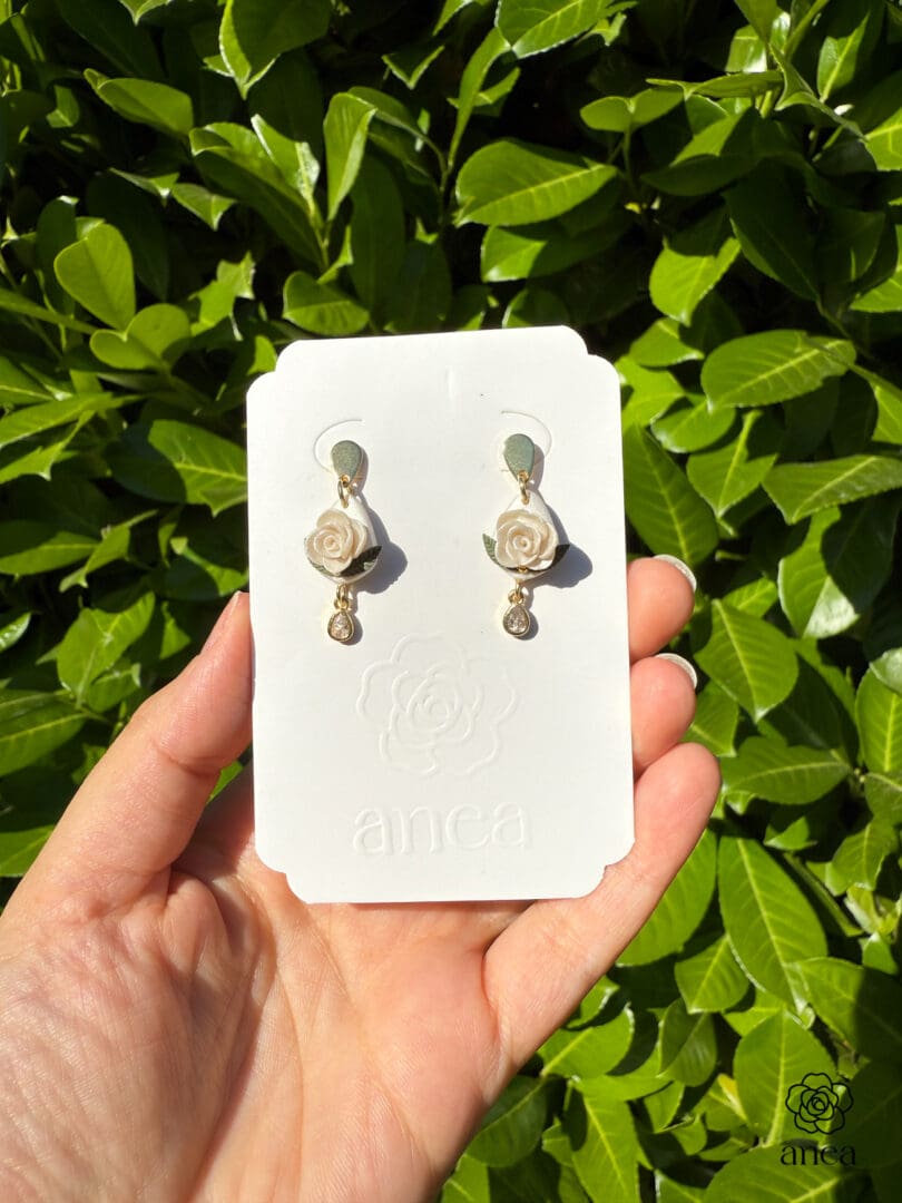 Camille | Pearlescent White Rose Earrings with Crystal Teardrop Charm - Image 2