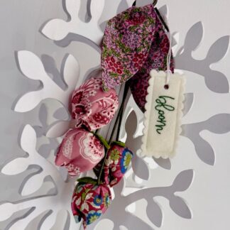 Beautiful ever lasting fabric spring, summer flower bud hanging bouquet in pretty pink and green. Unique whimsical floral gift