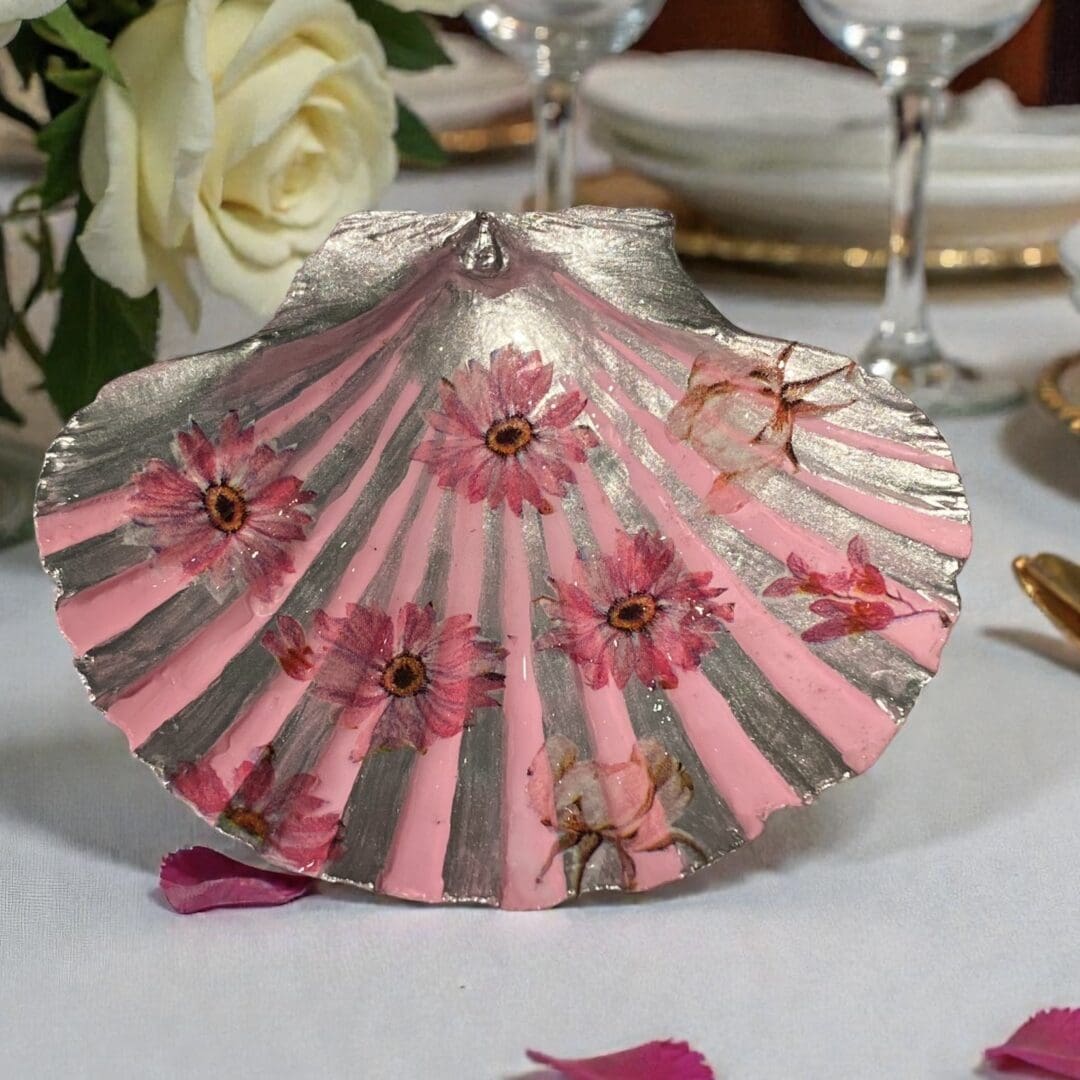 Handcrafted Decoupaged scallop shell featuring lovely daisies