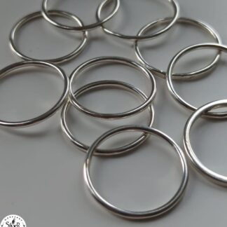 Thin silver band stacking rings