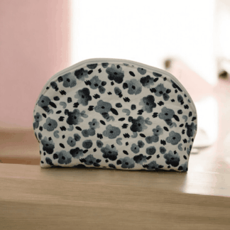 Blue flowered make up bag domed shape