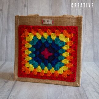 Crochet decorated small jute bag in red rainbow