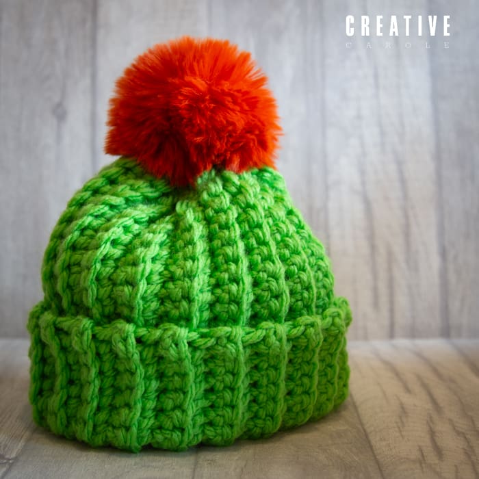 Crochet winter woolly bobble hat handmade in bright green