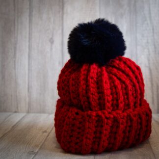 Crochet winter woolly bobble hat handmade in dark read