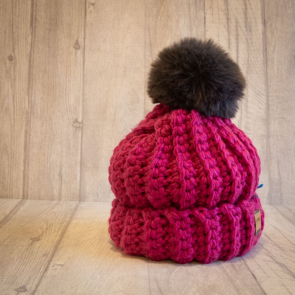 Crochet winter woolly bobble hat handmade in pink