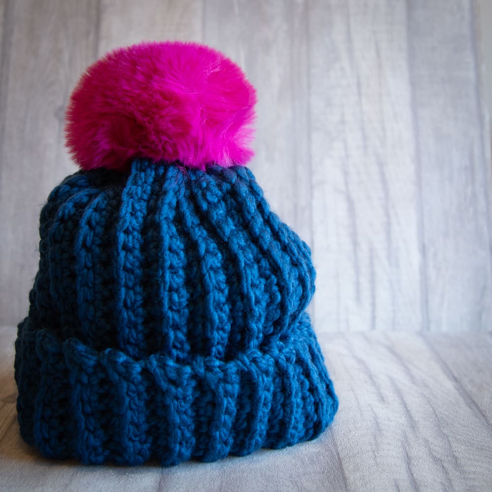 Crochet winter woolly bobble hat handmade in teal