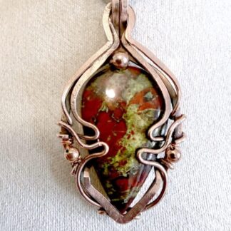 Dragons Blood Crystal and copper pendant