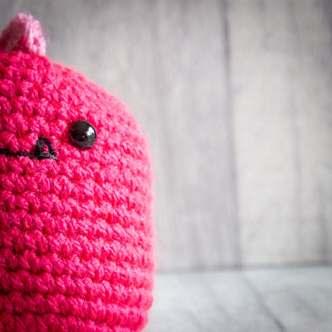 Handmade crochet baby dinosaur ukca approved in pink