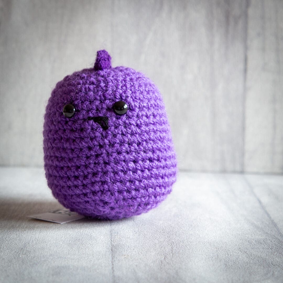 Handmade crochet baby dinosaur ukca approved in purple