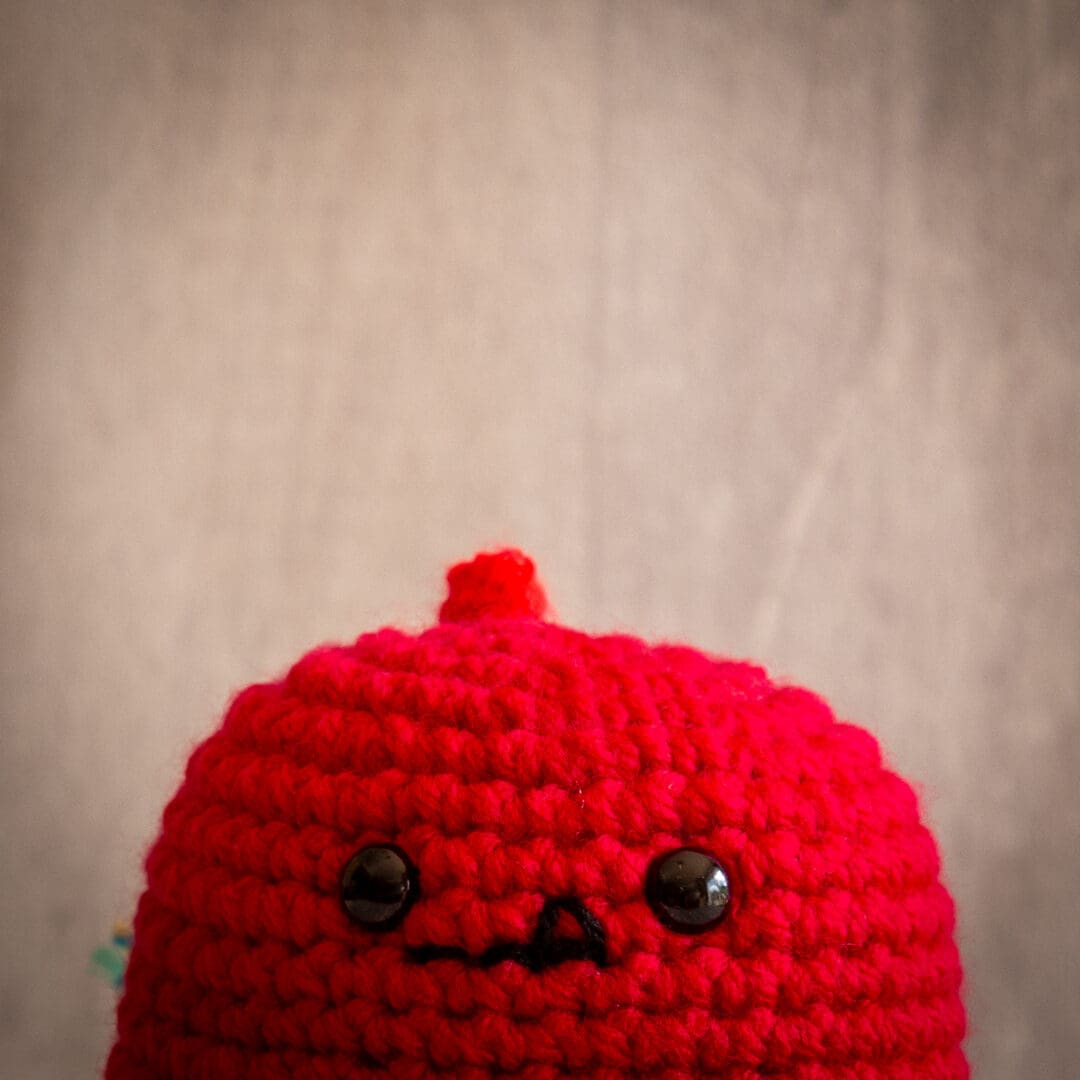Handmade crochet baby dinosaur ukca approved in red