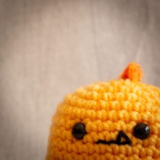 Handmade crochet baby dinosaur ukca approved in yellow