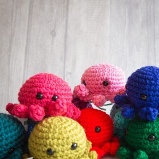 Handmade crochet baby octopus ukca approved group photo all colours