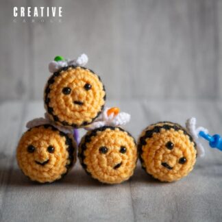 Handmade crochet bee keyrings ukca approved black and yellow