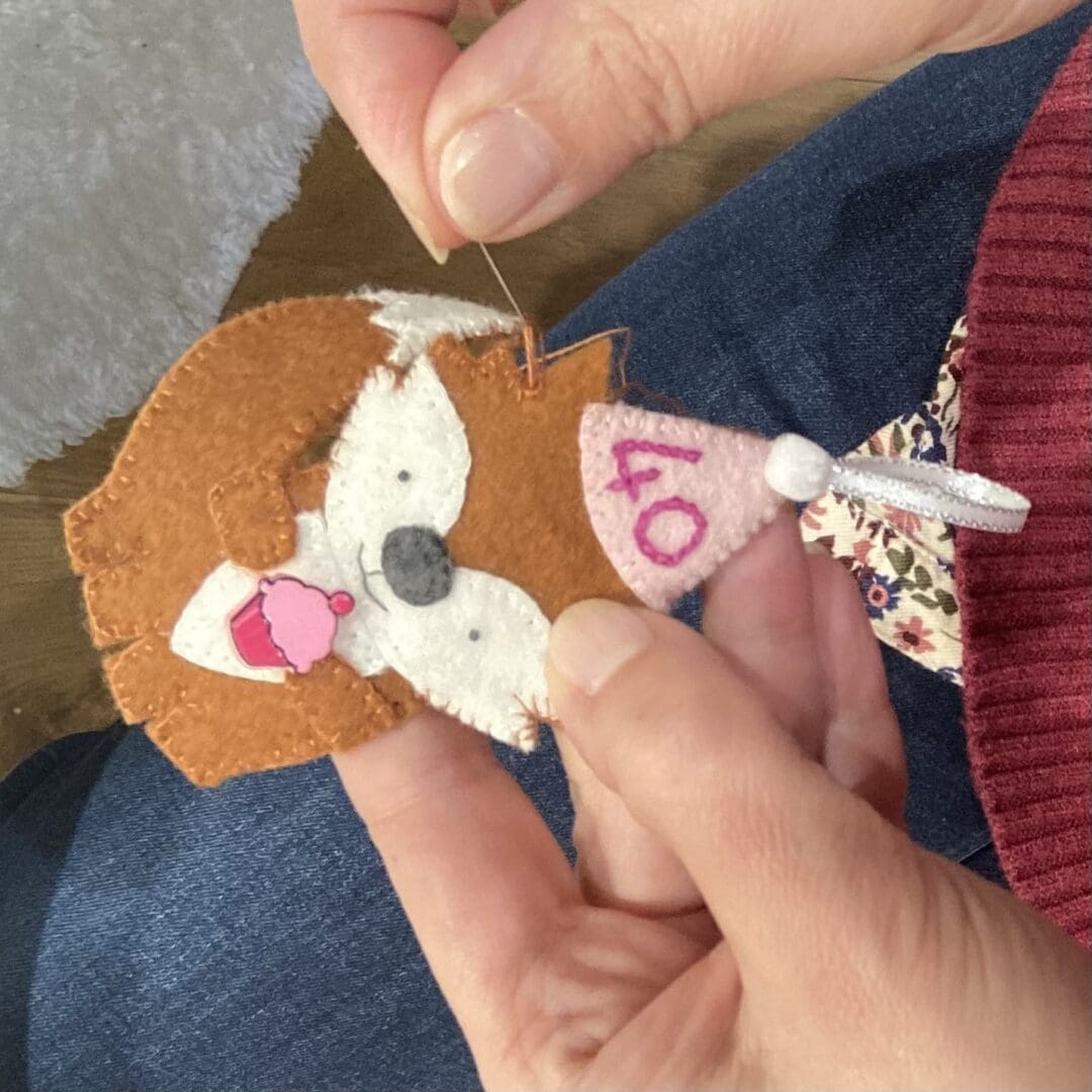 Hand sewing one of my little birthday foxes