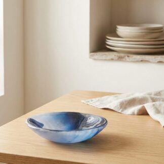 Handmade blue marbled glass trinket dish with swirling patterns, small artisan bowl for jewellery.