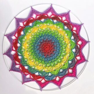 Handmade crochet mandala in glitter rainbows