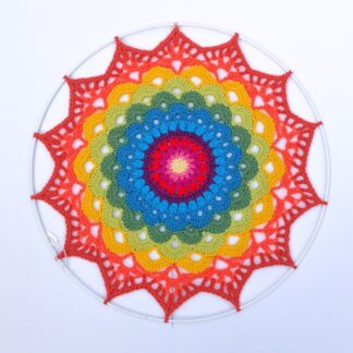 Handmade crochet mandala in rainbow colours