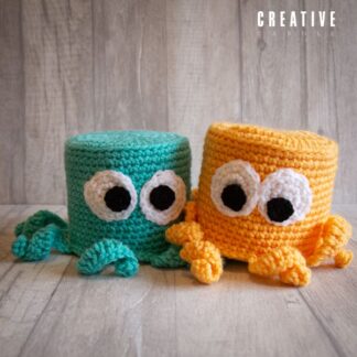 Handmade crochet octopus loo roll cover