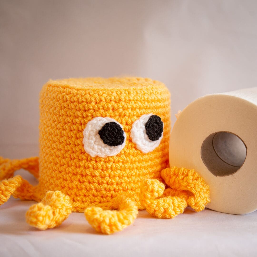 Handmade crochet octopus loo roll cover yellow
