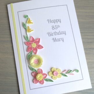 handmade 85th birthday card with quilled flowers in pink and lemon and personalised message