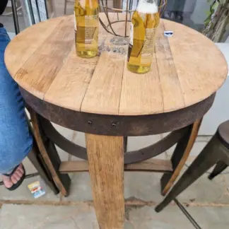 rustic pub table made from a whisky barrel