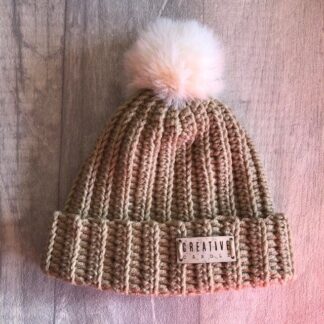 handmade crochet new born bobble hat. Super soft in beige with a cream pom pom
