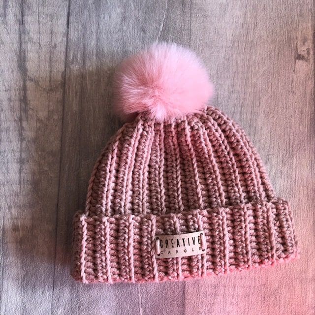 new born handmade crochet bobble hat in dusky pink with pale pink pom