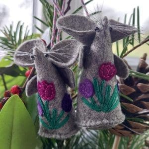 a group picture of 2 handmade felt mice with purple applique tulips
