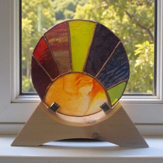 handmade stained glass sunrise on wooden stand