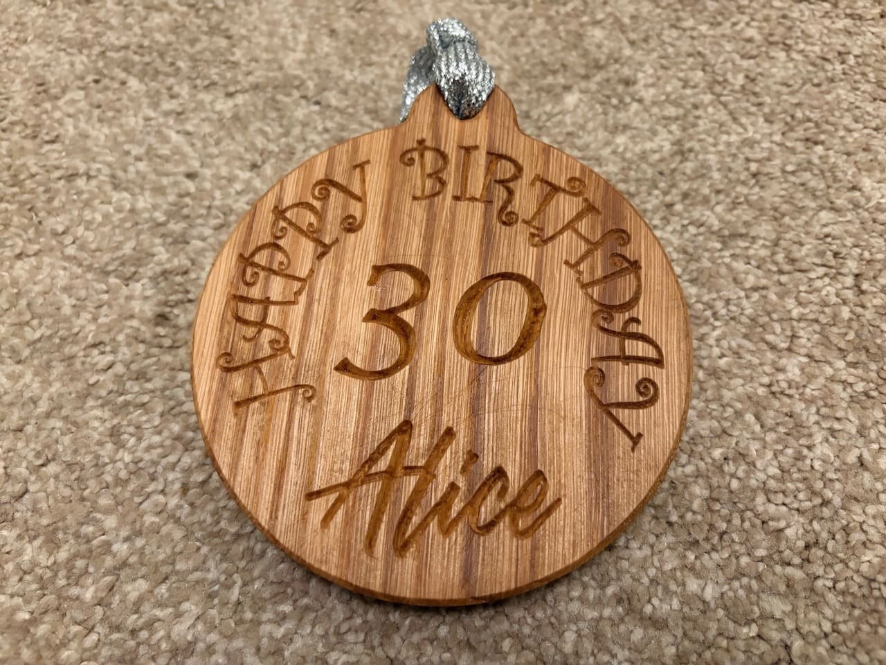 Wooden Birthday medal.