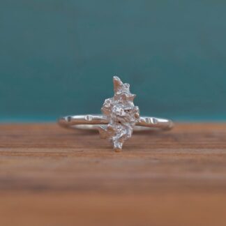 Bespoke hammered recycled silver snowflake ring cast in rock salt and made in Cornwall