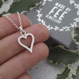 Handmade sterling silver open heart pendant on a silver mini belcher chain with Made By Fee presentation box in background