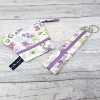 A floral coin purse and key fob set