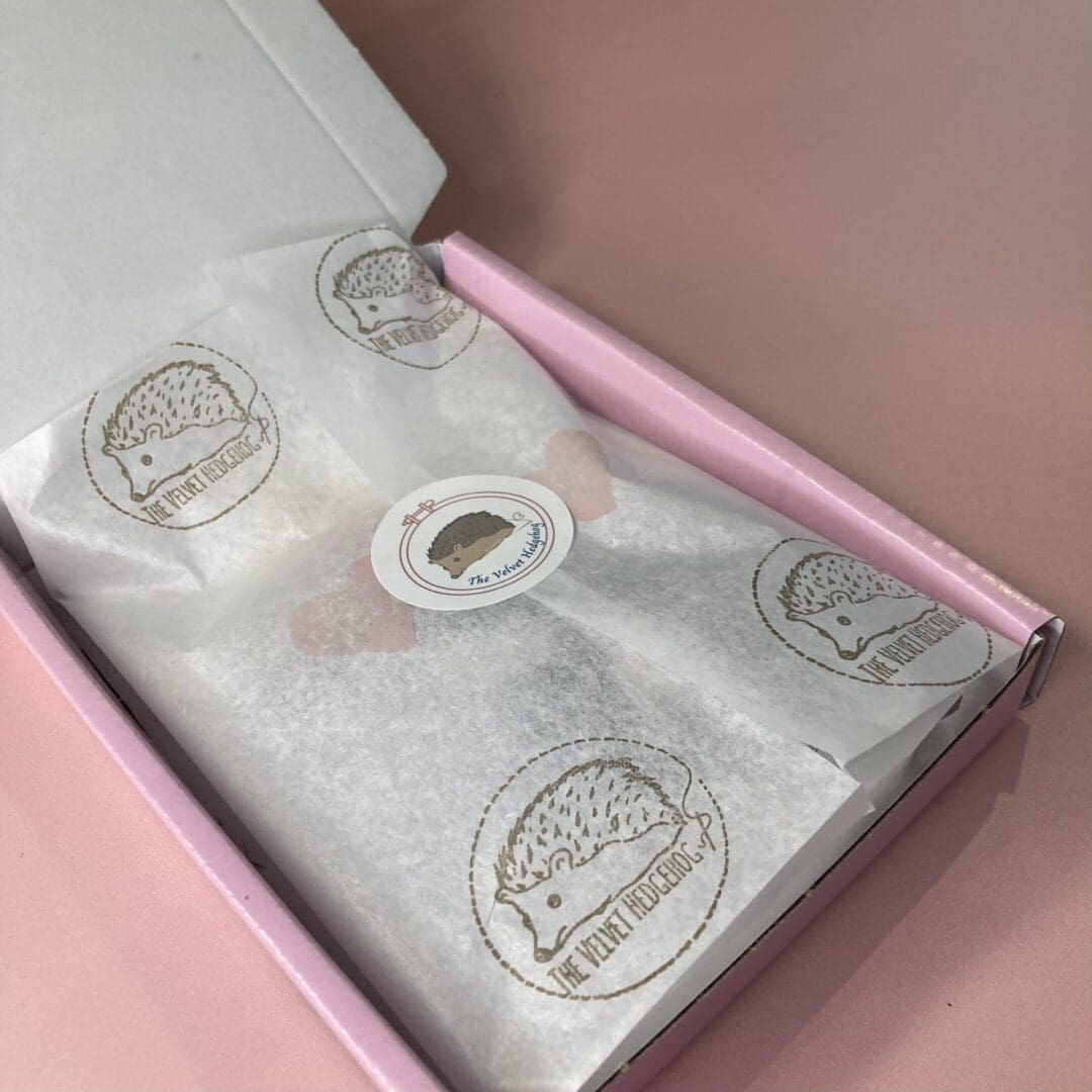 Your order will come in hand stamped tissue paper, sealed with a logo sticker before being placed in a box for posting.