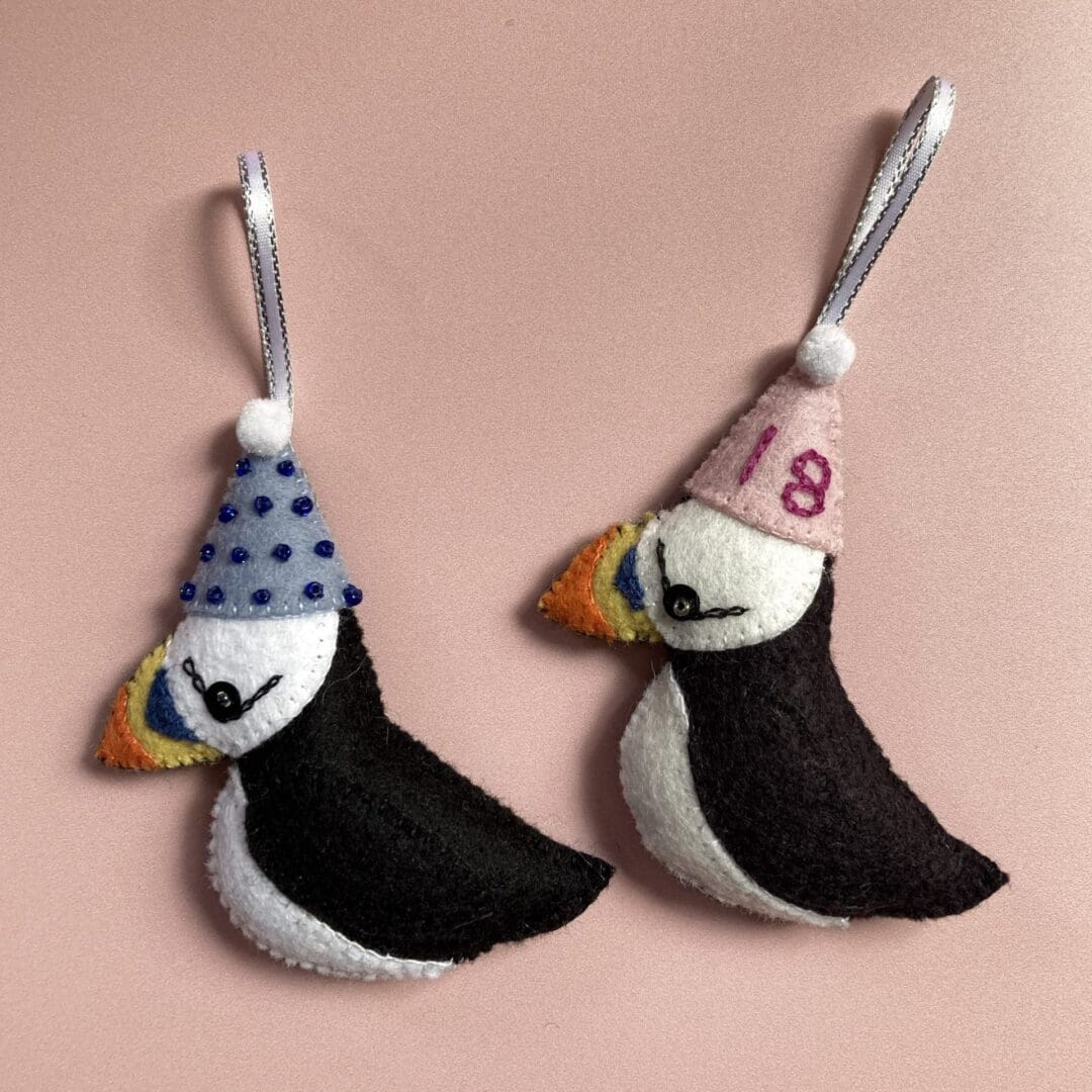 My puffins are available with blue and pink party hats