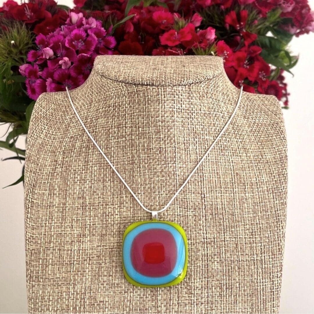 Large chunky fused glass pendant. Squares in bright colours of the rainbow