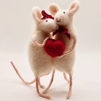 Two cuddling needle felt white mice, carrying a felt heart