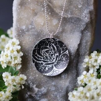 Domed abstract rose reversible pendant