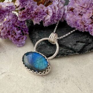 Handmade sterling silver necklace with an oval blue‑green labradorite pendant.