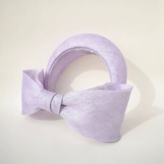 lilac fascinator headband with large bow, handmade in sinamay using traditional millinery techniques