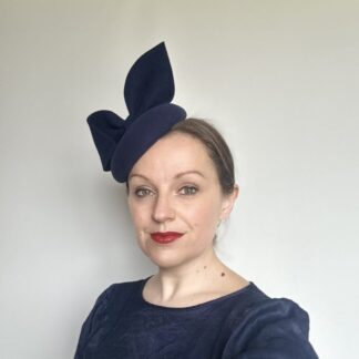 womens navy blue felt fascinator hat with oversized bow.
